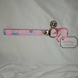 Lilly Pulitzer strap Keychain features style "Spendor in The Sand"